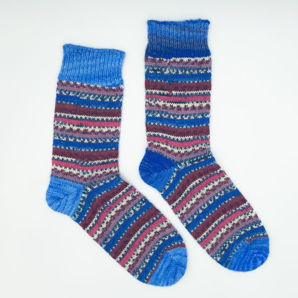 hand cranked patterned socks in purple, blue, pink and white