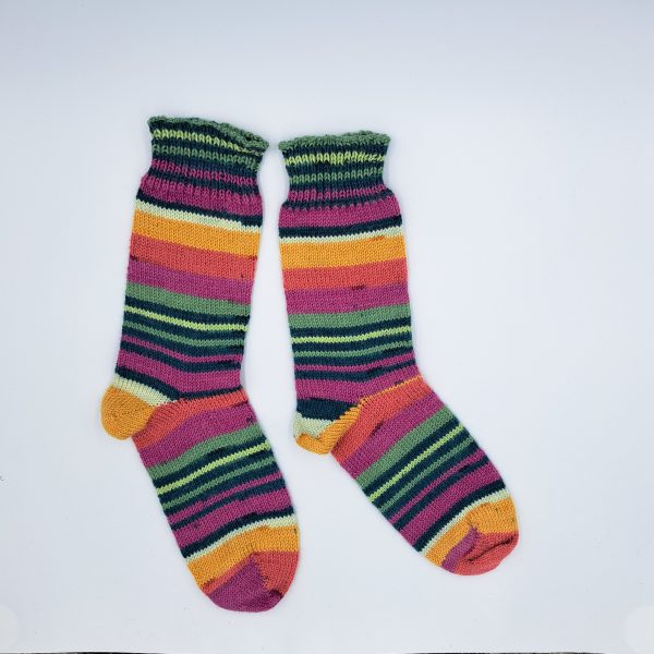 hand cranked stripey socks in pink, greens, purple, yellow and orange