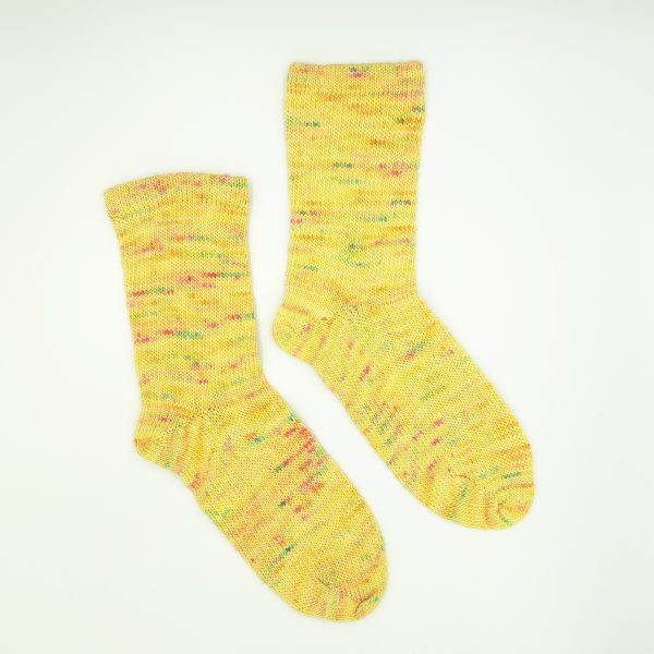 hand cranked socks in pale yellow with complimentary highlights